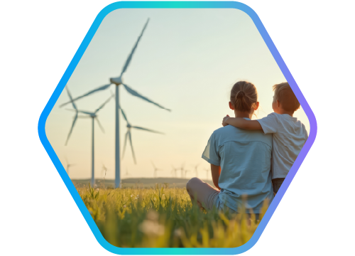 pai e filho abra�ados em campo de energia e�lica